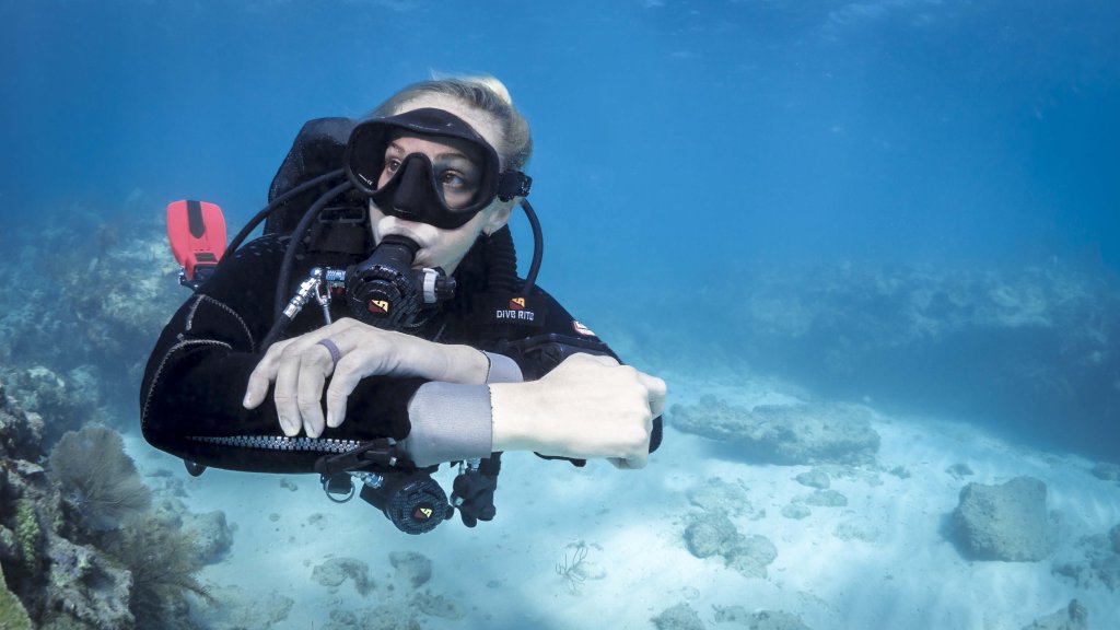Diver exploring the ocean with a camera
